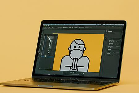 Ein Macbook Pro vor orangem Hintergrund, auf dem in Adobe Illustrator eine gezeichnete Person mit Maske betend abgebildet ist.